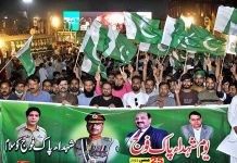 People from different walks of life participating in a walk rally to express solidarity with the Pak Army on the day of Youm-e-Takreem-e-Shuhda-e-Pakistan at Ghanta Ghar