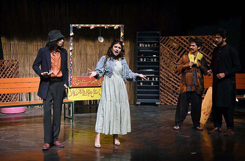 Artists performing on the stage during a drama titled "Roshanae" by Naatak Foundation during Alhamra Theater Festival in collaboration with Lahore Arts Council at Al-Hamra