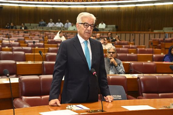 Khawaja Asif calls strong action against illegal human trafficking