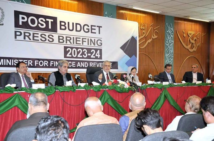 Finance Minister Senator Mohammad Ishaq Dar addresses the Post Budget press conference at Ministry of Planning
