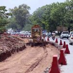 Heavy machinery being used to a expand a road at Chak Shahzad neighbourhood in the Federal Capital