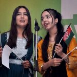 Girls presenting national song during World Refugee day organized by the office of the United Nations for Refugees at local hotel