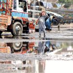 The sewarage water accumulated on the road in the vegetable Market is a health hazard and requires urgent attention from the authorities