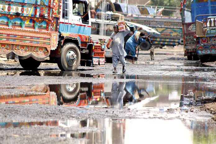 The sewarage water accumulated on the road in the vegetable Market is a health hazard and requires urgent attention from the authorities The sewarage water accumulated on the road in the vegetable Market is a health hazard and requires urgent attention from the authorities