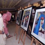 Participants viewing Art exhibition during World Refugee day organized by the office of the United Nations for Refugees at local hotel