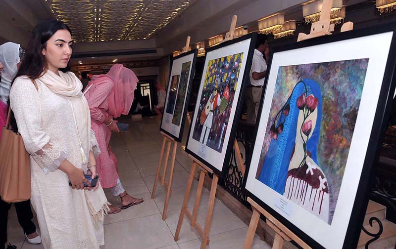 Participants viewing Art exhibition during World Refugee day organized by the office of the United Nations for Refugees at local hotel