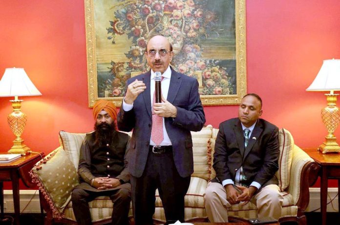Promote inter-religious harmony, Masood Khan urges faith leaders
