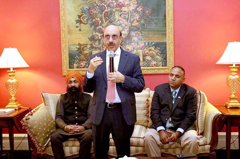 Ambassador Masood Khan addressing faith and community leaders at Pakistan House