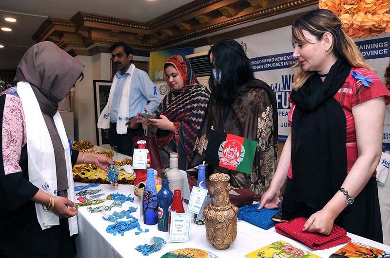 Participants viewing Art exhibition during World Refugee day organized by the office of the United Nations for Refugees at local hotel