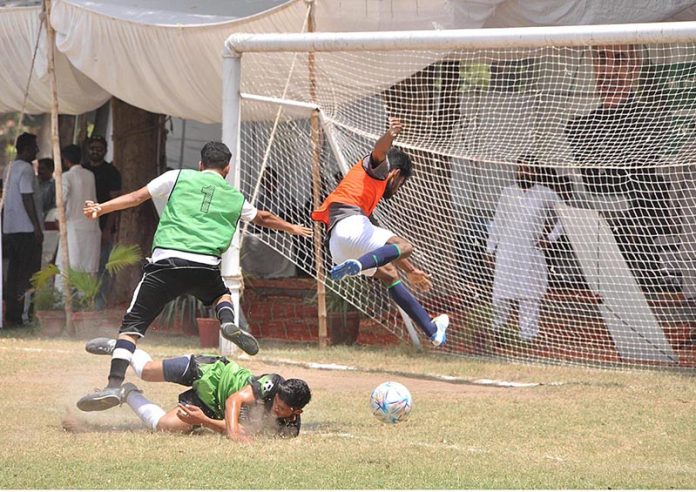 Students are giving Football trials for Prime Minister's Youth Programme Talent Hunt Youth Sports League organized by University of Sargodha Supervision of Higher Education Commission