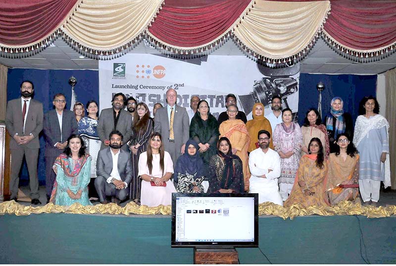 Country Representative, UNFPA, Dr. Luay Shabaneh, Member Parliament and Secretary of Women's Parliamentary Caucus Dr. Shahida Rehmani and Vice Chancellor Fatima Jinnah Women University Dr Saima Hamid in a group photo with participants during the launching ceremony of the 2nd Naqsh Digital Film Festival (NDFF) organized by Department of Communication and Media Studies, Fatima Jinnah Women University