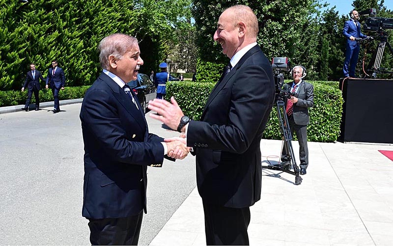 President of Azerbaijan Ilham Aliyev receives Prime Minister Muhammad Shehbaz Sharif upon his arrival at Zugulba Palace