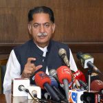 Federal Minister Javed Latif holding a press conference