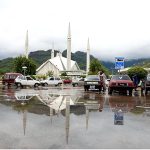 Clouds hovering over the Faisal Mosque after heavy rain