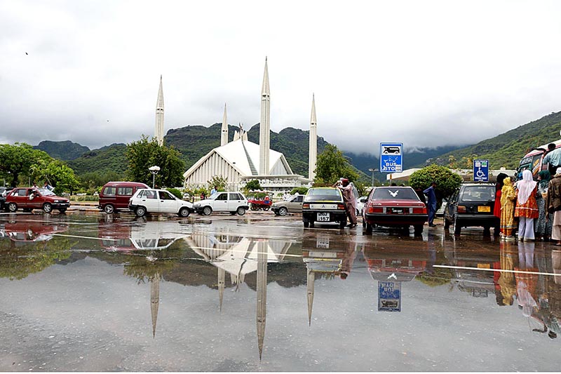 Clouds hovering over the Faisal Mosque after heavy rain