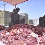 Butchers are cutting meat into pieces after sacrificing animals on the 2nd day of Eid Ul Azha at I-9.