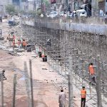 Labourers are busy in construction work of Sumanabad Underpass during development work in Provincial Capital