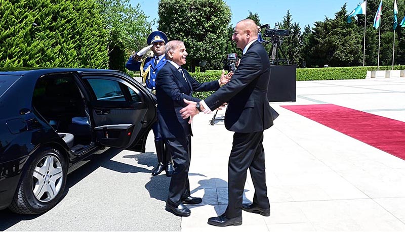 President of Azerbaijan Ilham Aliyev receives Prime Minister Muhammad Shehbaz Sharif upon his arrival at Zugulba Palace