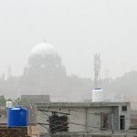 A view of the Shrine of Shah Ruknuddin Alam covered with Dust storm in the city