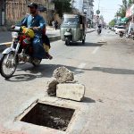 A view of open manhole on the Railway Station Road