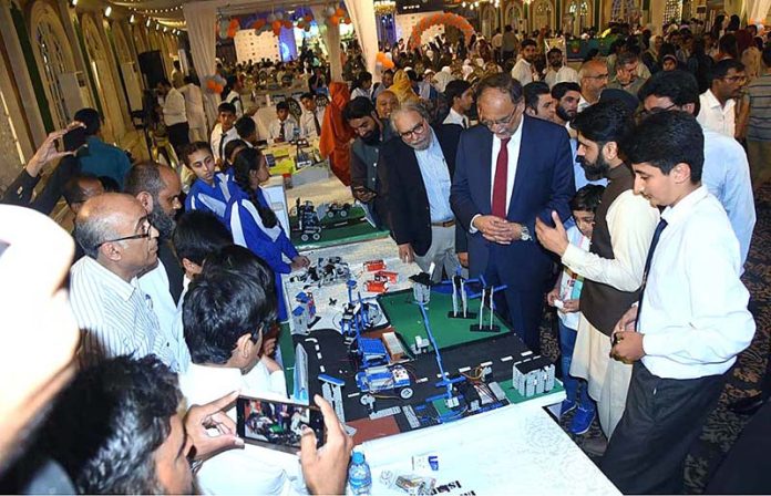 Federal Minister for Planning Development & Special Initiatives Ahsan Iqbal visiting stalls during the Inauguration session of International EdTech Conference