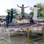 Children are jumping on the jumping jack on the occasion of Darbar Hazrat Syed Peer Sakhi Sultan Ahmed Shah’s annual Urs