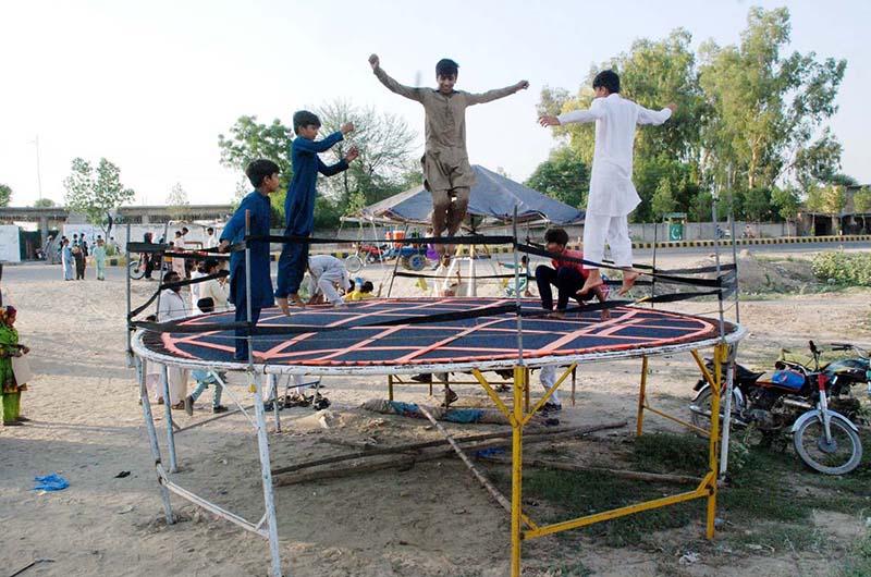 Children are jumping on the jumping jack on the occasion of Darbar Hazrat Syed Peer Sakhi Sultan Ahmed Shah’s annual Urs