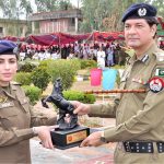 Principal Police Training School Sargodha, Dr Anam Faryal Afzal giving a memorial model to RPO Sargodha Shariq Kamal Siddique during 92th Police Passing out parade at Police Tarining School
