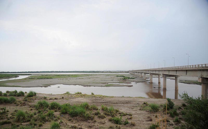 A view of the dry bed of River Chenab near Head Muhammad Wala