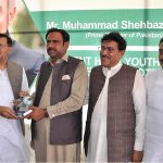 VC University of Sargodha Prof. Dr. Qaisar Abbas giving a shield to PML(N) Former MPA Rana Munawar Ghous during Men & Women Football trials for Prime Minister's Youth Programe Talent Hunt Youth Sports League organized by University of Sargodha Supervision of Higher Education Commission