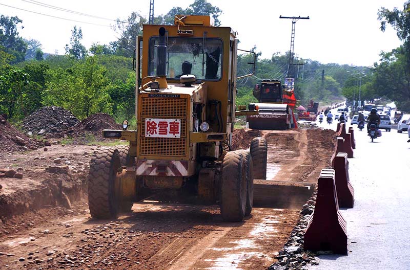 Machinery being used for extension work of Park road during the development work in federal capital