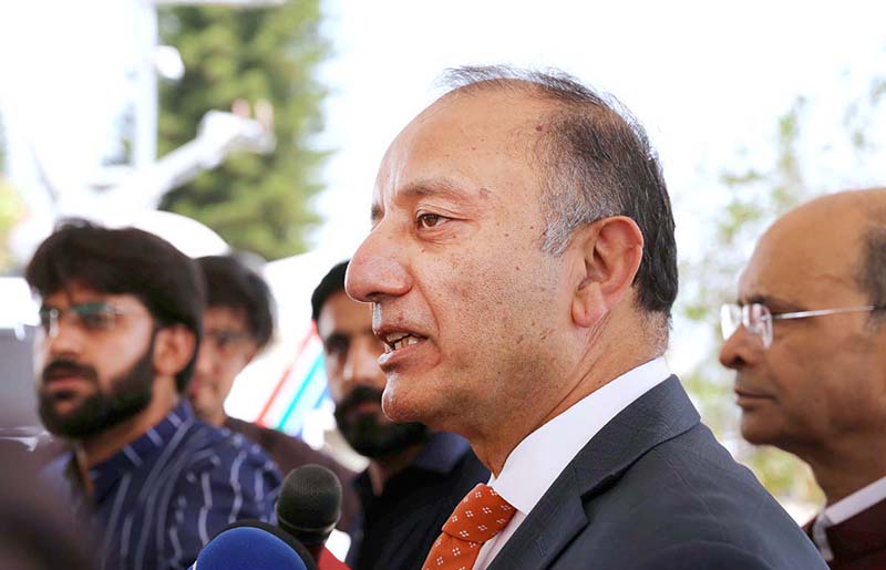 Minister of State for Petroleum, Dr. Musadik Malik talking to media persons while arrives to attend budget session at Parliament House
