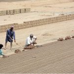 Labourers busy in preparing bricks at a Local Bricks Kiln