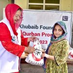 Principal Khubaib Girl School & College, Sarwat Ansar distributing meat among the deserving people donated by Zakaat Foundation America at Khubaib Girls School & College on the 2nd day of Eid-ul-Adha