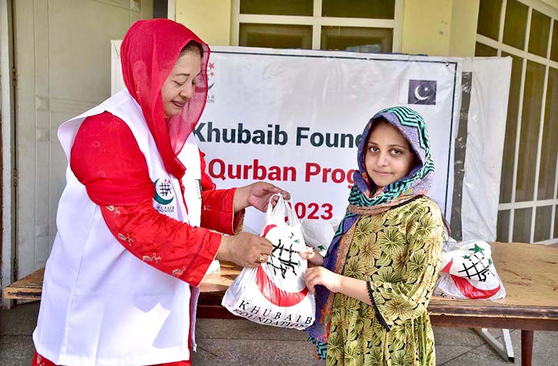 Principal Khubaib Girl School & College, Sarwat Ansar distributing meat among the deserving people donated by Zakaat Foundation America at Khubaib Girls School & College on the 2nd day of Eid-ul-Adha