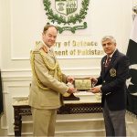 Secretary Defence, Lt Gen (Retd) Hamood Uz Zaman Khan presenting a gift to General Sir Patrick Nicholas, British Army chief of the General Staff, in Ministry of Defence