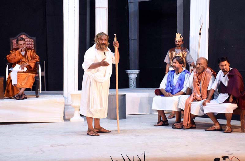 Artists performing drama " SUQRAT " presented by Arts Council of Pakistan during Sindh Theatre Festival 2023 at ZA Bhutto Open Air Theater