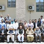 President Dr. Arif Alvi in a group photo with the organizers and participants of the International Conference on Health Research