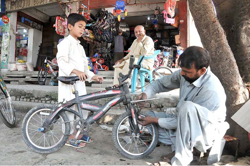 A skilled person reparing a bicycle at his roadside workplace in Aabpara Market. In April 2018, the United Nations General Assembly declared June 3 as World Bicycle Day. The resolution for World Bicycle Day recognizes "the uniqueness, longevity and versatility of the bicycle, which has been in use for two centuries, and that it is a simple, affordable, reliable, clean and environmentally fit sustainable means of transport