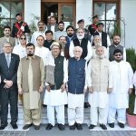 President Dr. Arif Alvi in a group photo with the Governor Khyber Pakhtunkhwa (KP), Haji Ghulam Ali, Caretaker Chief Minister KP, Muhammad Azam Khan, and members of the provincial cabinet, at Governor House