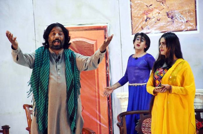 Artists performing drama 