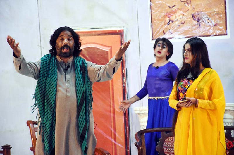 Artists performing drama " Dilbar Jani " during Sindh Theatre Festival 2023 at ZA Bhutto Open Air Theater Arts Council