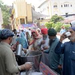 People are drinking water during main ceremony-Bhog Akhand Paatg Sahib to observe Martyrdom Day of Guru Arjun Dev Jee at Gurdawara Dera Sahib