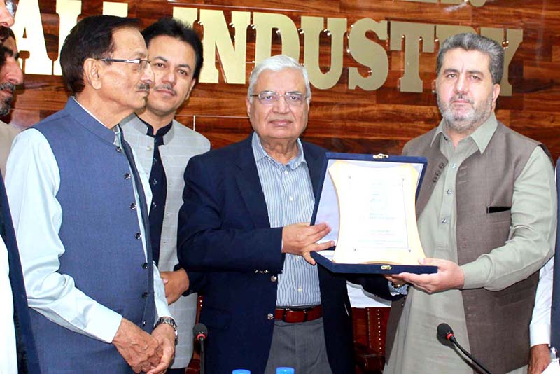 President Quetta Chamber of Small Industries presents shield to Federal Ombudsman Ejaz Qureshi during his visit to Chamber of Small Industries