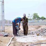 Labourers are busy in digging during development work at the historical Qasim Fort Stadium