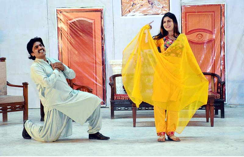 Artists performing drama " Dilbar Jani " during Sindh Theatre Festival 2023 at ZA Bhutto Open Air Theater Arts Council