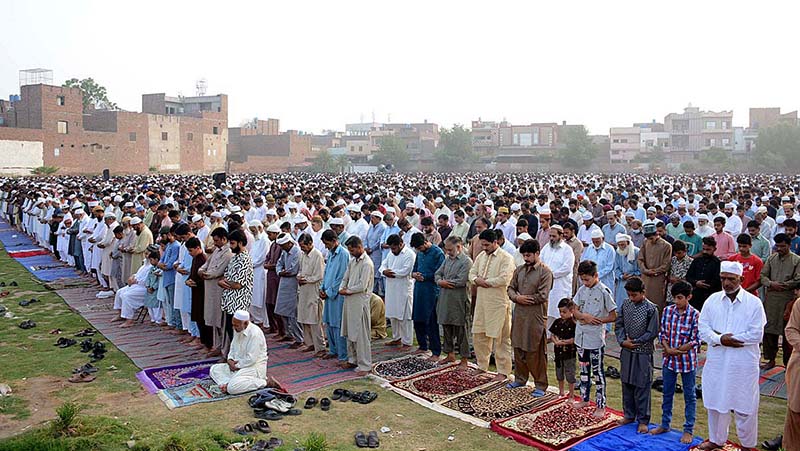 A large number of faithful offering Eid-ul-Azha prayers at Haji Abad Ground