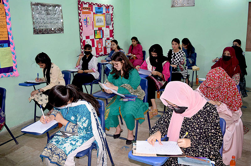 Female students giving a pre-entry test for admission 11th class of science group at County Girls Collage