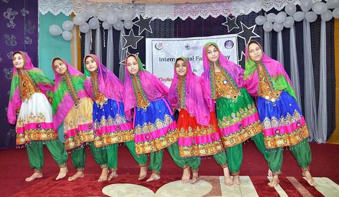 Students performing tableau on the occasion of International Father's Day organized by Bardasht Organization at Khubaibe Girls School & College