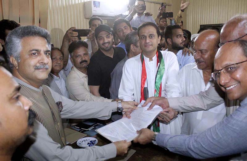 Spokesman for Sindh Government and Advisor to Sindh Chief Minister on Law Murtaza Wahab submitting his nomination papers for the slot of Mayor of Karachi at Provincial Election Commission of Pakistan. PPP leaders Nisar Ahmed Khuhro, Saeed Ghani, Waqar Mehdi are also present on the occasion